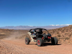 Buggy driving through desert